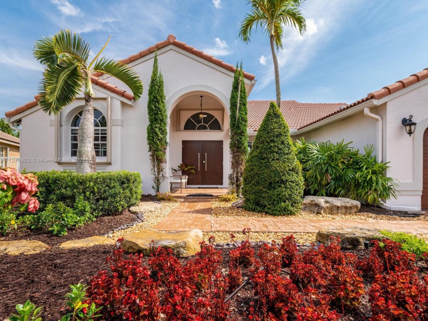 This exquisite, one-story single family home in Weston-Lakes - Beach Home for sale in Weston, Florida on Beachhouse.com
