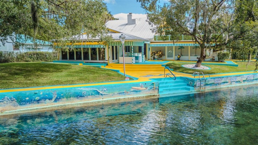 Welcome to this rare opportunity to own this ICONIC RIVERFRONT - Beach Home for sale in Weeki Wachee, Florida on Beachhouse.com