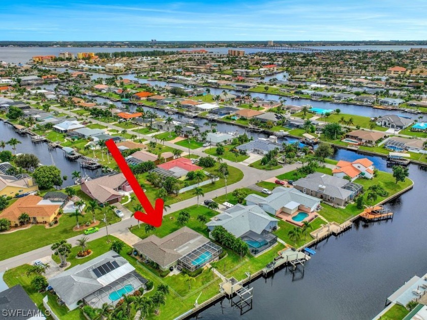Direct Gulf Access waterfront pool home situated on a wide canal - Beach Home for sale in Cape Coral, Florida on Beachhouse.com