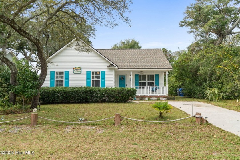 Discover this delightful southeast-side beach retreat, perfectly - Beach Home for sale in Oak Island, North Carolina on Beachhouse.com