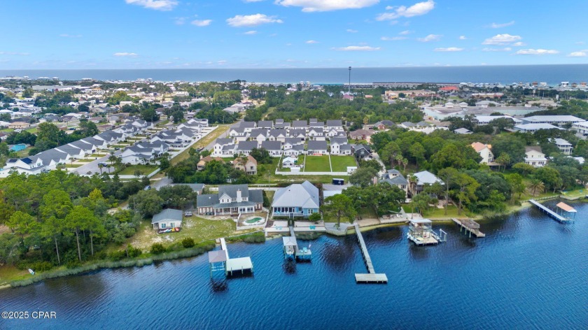 CUSTOM LAKE FRONT HOME WITH PRIVATE DOCK, BOATHOUSE FEATURING 6K - Beach Home for sale in Panama City Beach, Florida on Beachhouse.com