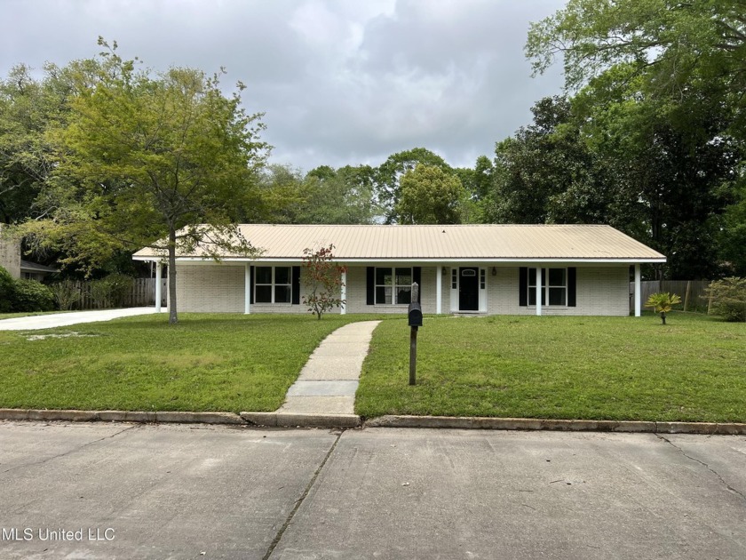 THIS BEAUTIFUL UPDATED HOMES HAS ALL THE SPACE YOU AND YOUR - Beach Home for sale in Pascagoula, Mississippi on Beachhouse.com