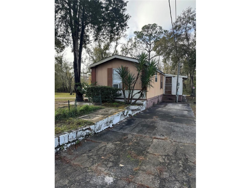 Unique opportunity to own three adjoining lots in the heart of - Beach Home for sale in New Port Richey, Florida on Beachhouse.com