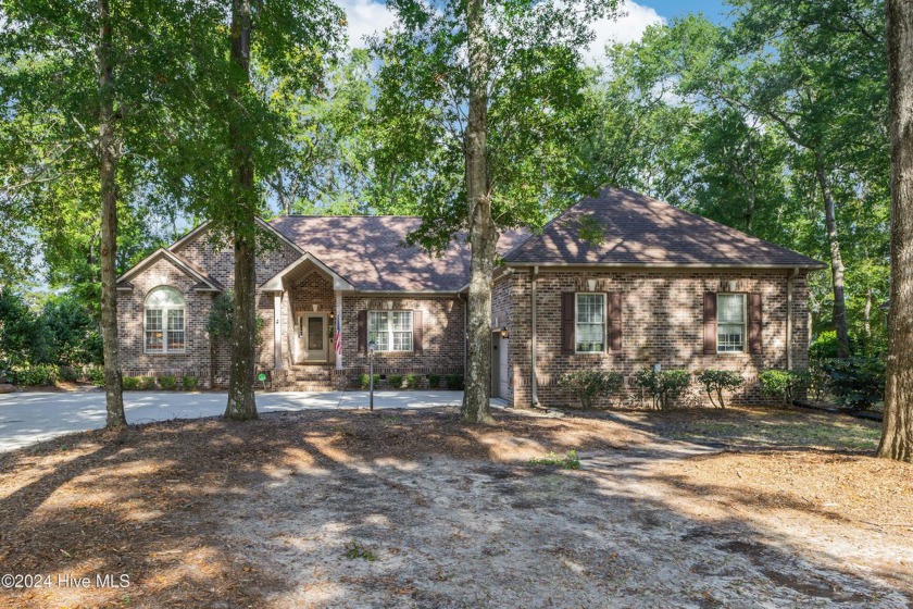 LOCATION LOCATION LOCATION!! Golf frontage BRICK exterior home - Beach Home for sale in Sunset Beach, North Carolina on Beachhouse.com