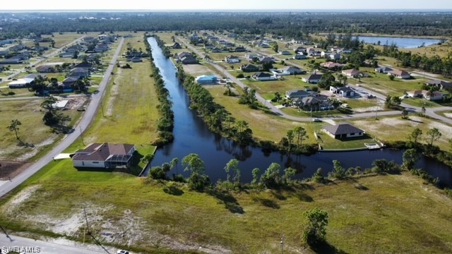 OVERSIZED TRIPLE WATERFRONT LOT. Build your dream home or buy it - Beach Lot for sale in Cape Coral, Florida on Beachhouse.com