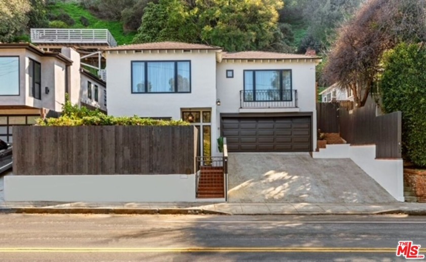 Located in one of the most coveted enclaves in the city, this - Beach Home for sale in Santa Monica, California on Beachhouse.com