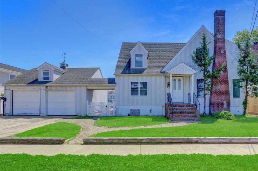 Waterfront Expanded Cape Style Home. This Home Features 4 - Beach Home for sale in Massapequa, New York on Beachhouse.com