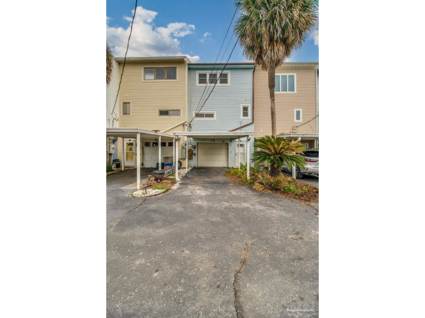 Dive into luxury living! This stunning townhome offers the - Beach Lot for sale in Pensacola, Florida on Beachhouse.com