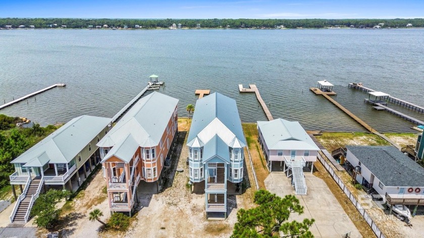 Beautiful 8-bedroom waterfront duplex on Little Lagoon in Gulf - Beach Townhome/Townhouse for sale in Gulf Shores, Alabama on Beachhouse.com