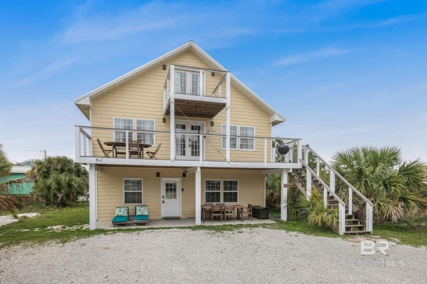 Discover the epitome of coastal living at 962 W Beach Blvd, Gulf - Beach Home for sale in Gulf Shores, Alabama on Beachhouse.com