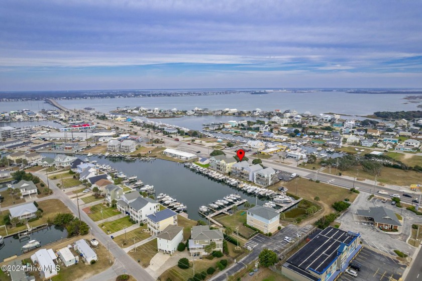 Canalfront condo with a 16,000-lb boat slip and lift, offering - Beach Condo for sale in Atlantic Beach, North Carolina on Beachhouse.com