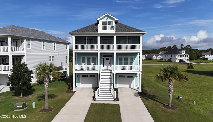 Perched along the Intracoastal Waterway, this exceptional - Beach Home for sale in Holly Ridge, North Carolina on Beachhouse.com
