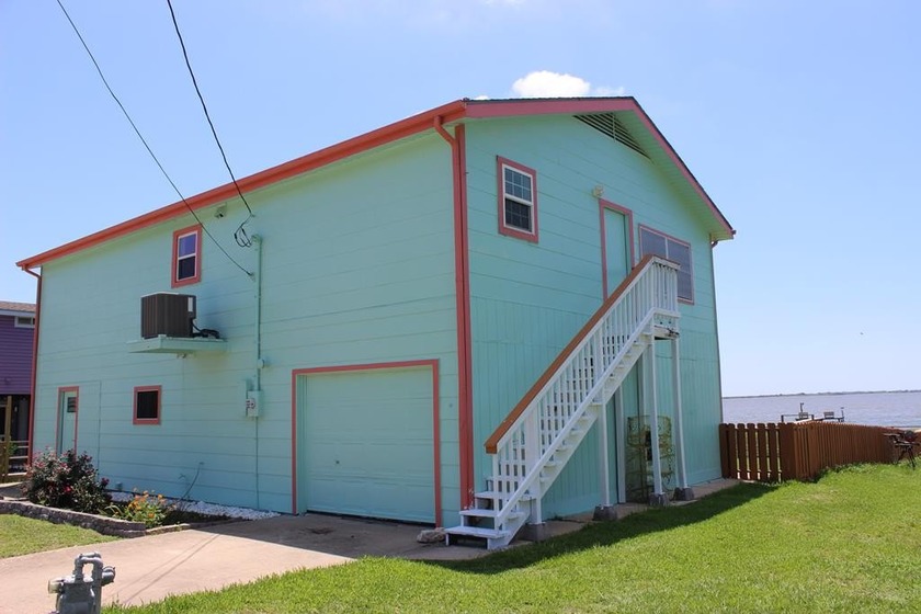 PRICE REDUCED - Waterfront property with pier.  House is 2 BR 2 - Beach Home for sale in Palacios, Texas on Beachhouse.com