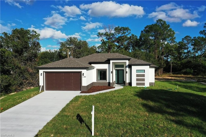 PRICE IMPROVEMENT! AGGRESSIVELY PRICED 2025 NEW BUILD ON 0.50 - Beach Home for sale in Lehigh Acres, Florida on Beachhouse.com