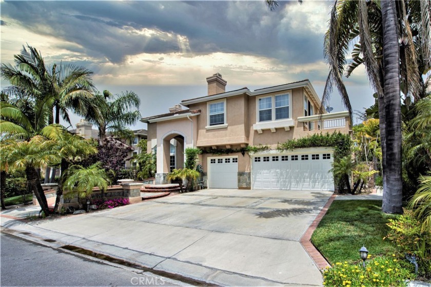 A Highly Sought-after Hampton Estates home features 5 large - Beach Home for sale in Huntington Beach, California on Beachhouse.com