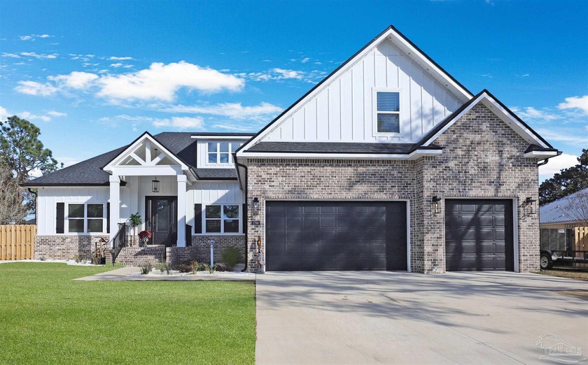 Built in 2025, this thoughtfully designed resale offers modern - Beach Home for sale in Navarre, Florida on Beachhouse.com