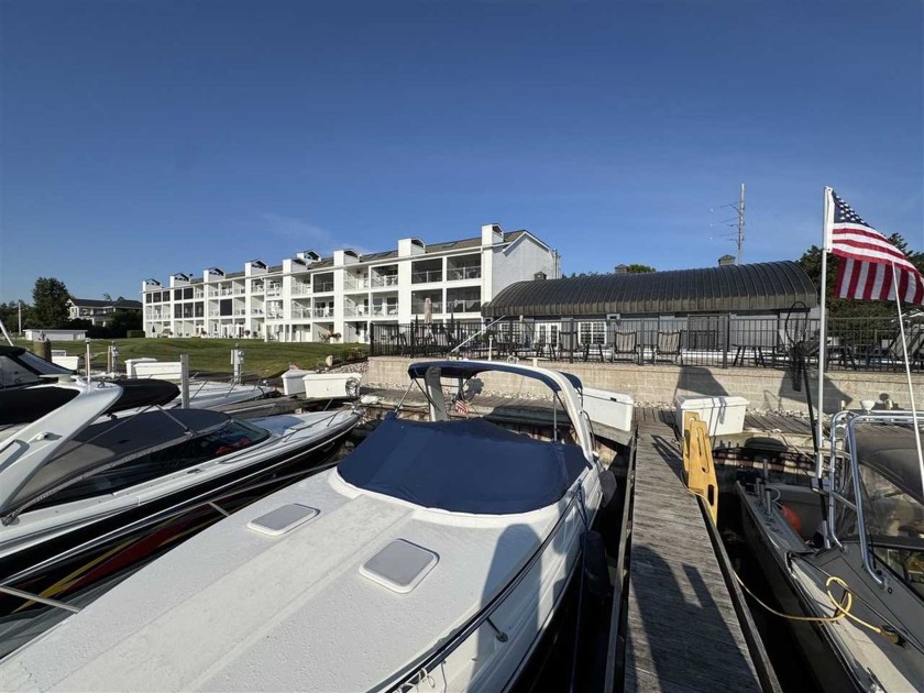 Slip #73 at Northwest Marine Yacht Club. Number 73 is a 30 foot - Beach Lot for sale in Charlevoix, Michigan on Beachhouse.com