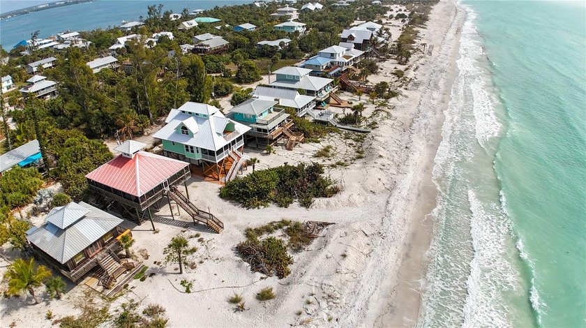 A Classic Beachfront Escape on Little Gasparilla Island! This - Beach Home for sale in Placida, Florida on Beachhouse.com