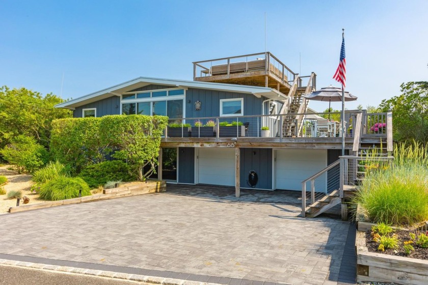 Nestled in the serene and sought-after Oak Beach Community, this - Beach Home for sale in Oak Beach, New York on Beachhouse.com