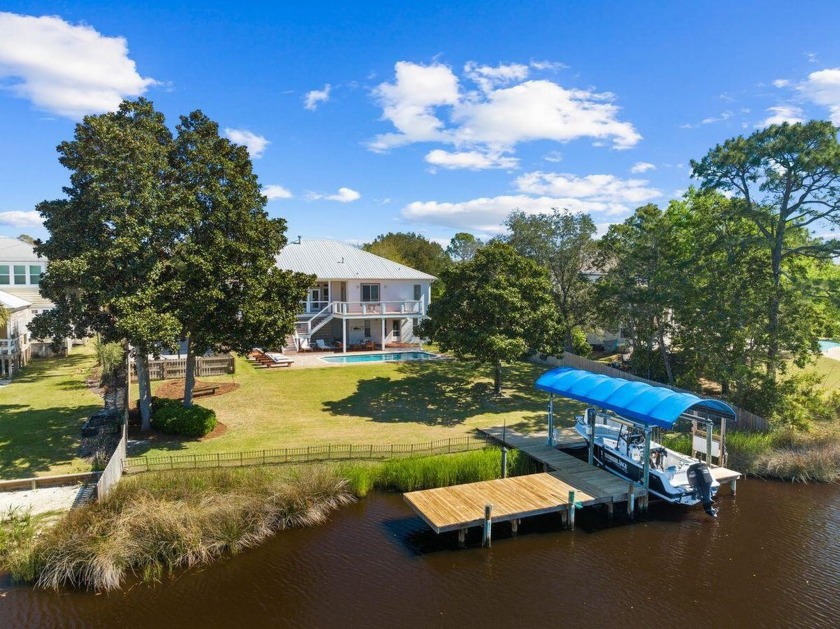 Perfectly situated on a spacious half-acre lot along a deepwater - Beach Home for sale in Destin, Florida on Beachhouse.com