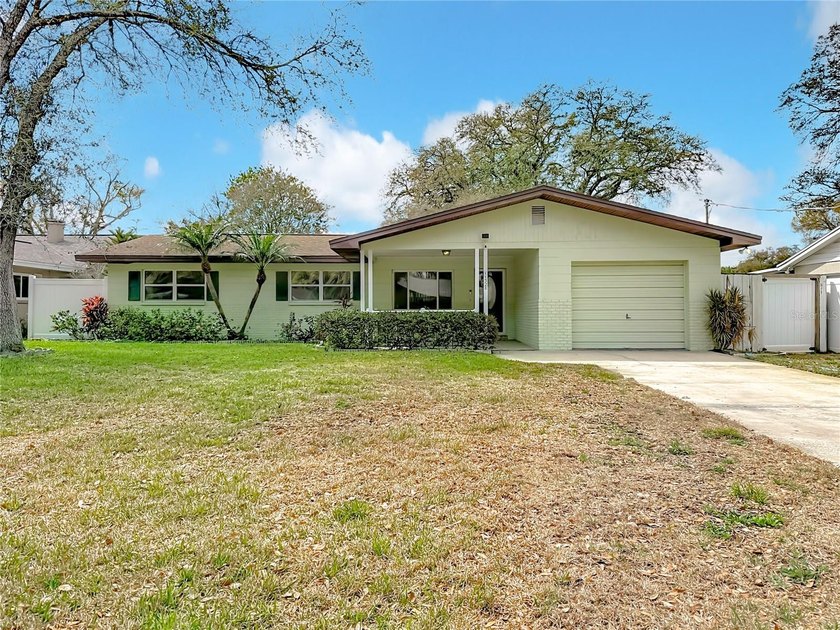 Located on a quiet cul-de-sac in the heart of Forest Hills, this - Beach Home for sale in Tampa, Florida on Beachhouse.com