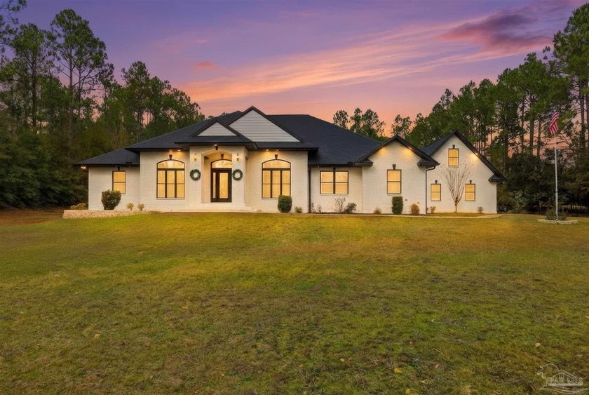 This extraordinary 3.1-acre estate with no HOA delivers a rare - Beach Home for sale in Pace, Florida on Beachhouse.com