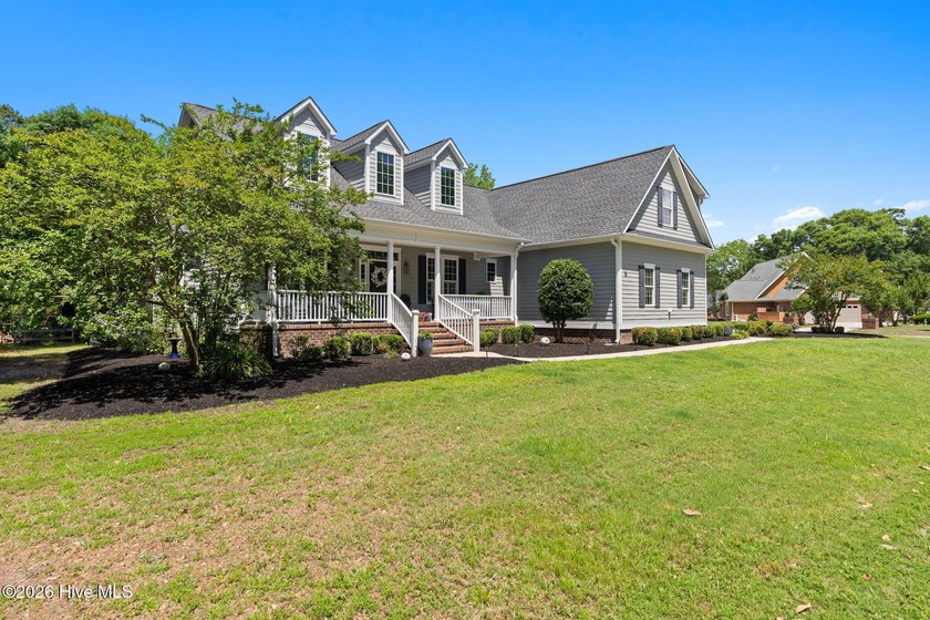 Perfectly positioned on an oversized homesite in sought-after - Beach Home for sale in Sunset Beach, North Carolina on Beachhouse.com