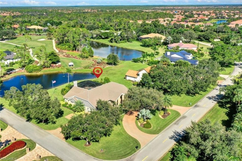 EXCEPTIONAL LAKE AND GOLF COURSE VIEWS FROM THIS GORGEOUS ESTATE - Beach Home for sale in Naples, Florida on Beachhouse.com