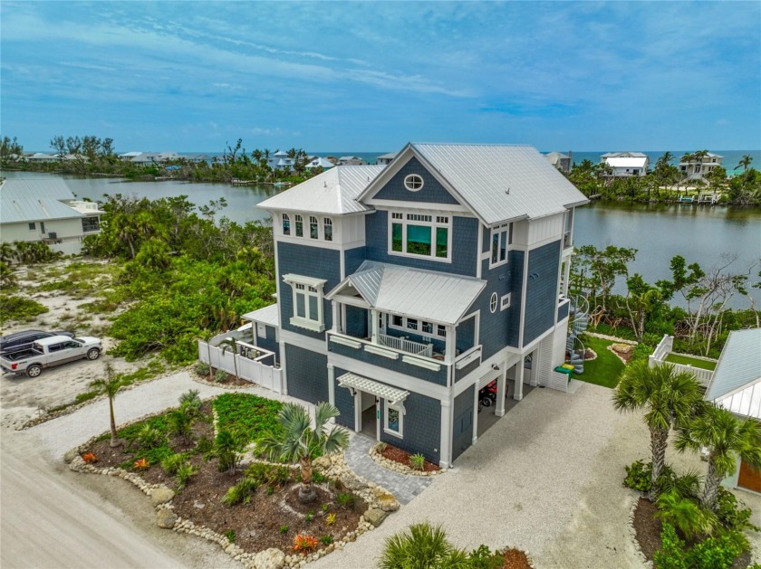 Welcome to Palm Island Paradise! This stunning waterfront - Beach Home for sale in Placida, Florida on Beachhouse.com