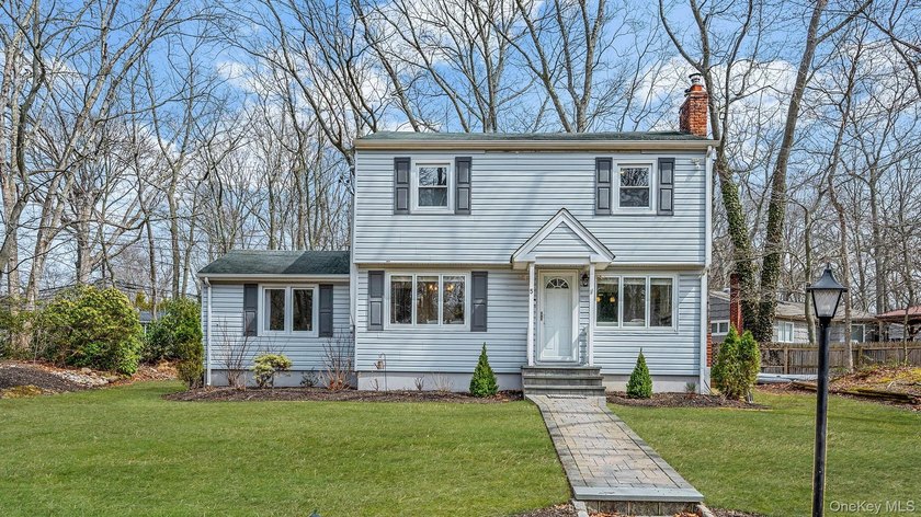 Welcome Home to this Diamond Colonial, Beautifully Updated, and - Beach Home for sale in Miller Place, New York on Beachhouse.com