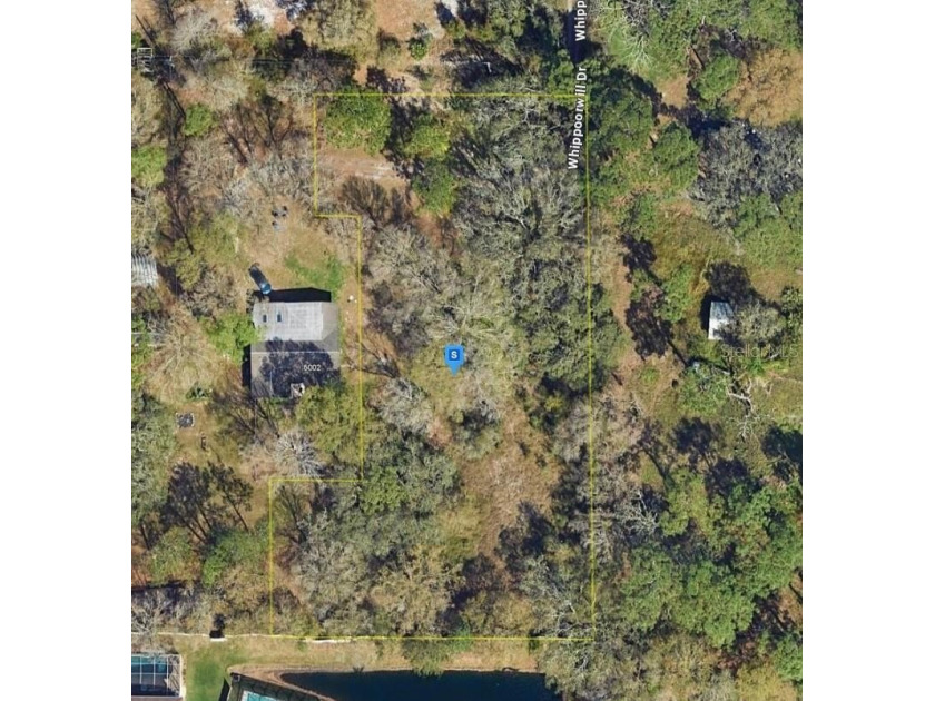 An outstanding opportunity awaits with this 1-acre vacant lot - Beach Lot for sale in Tampa, Florida on Beachhouse.com