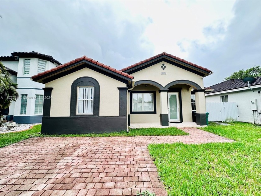 Discover this spacious 4 bedroom, 2 bath home. Enjoy tranquil - Beach Home for sale in Homestead, Florida on Beachhouse.com