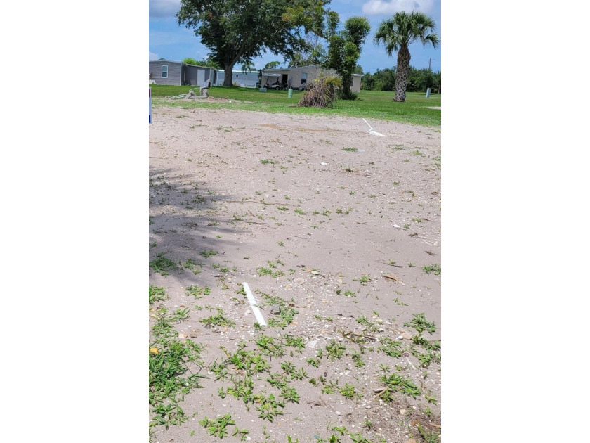 Welcome to this friendly WATERFRONT COMMUNITY, the Village of - Beach Lot for sale in Port Charlotte, Florida on Beachhouse.com