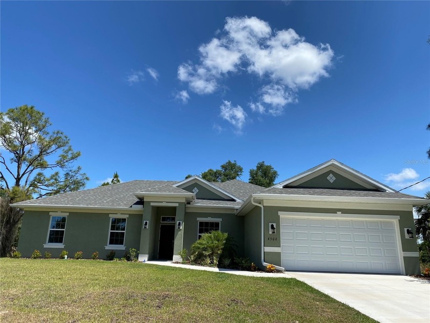 PRICE REDUCED!! MOVE IN READY! New construction home. Oversized - Beach Home for sale in North Port, Florida on Beachhouse.com