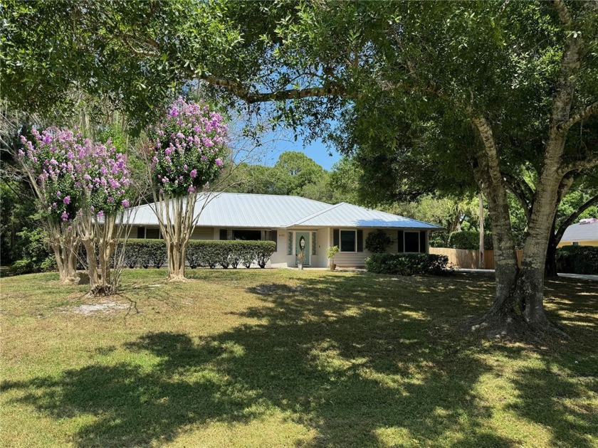 Rarely available - 1/2 acre+ oak tree canopied home situated on - Beach Home for sale in Vero Beach, Florida on Beachhouse.com