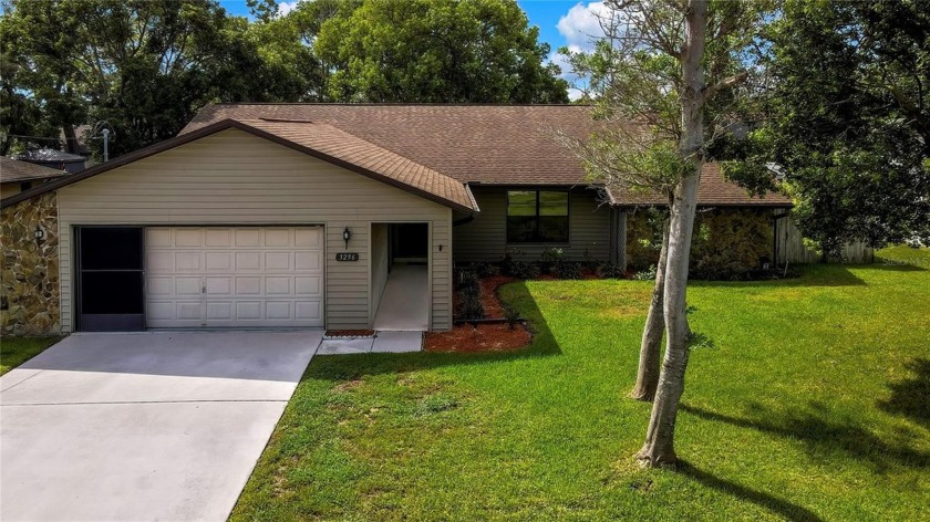 Location and Curb appeal will inspire you to book an appointment - Beach Home for sale in Spring Hill, Florida on Beachhouse.com