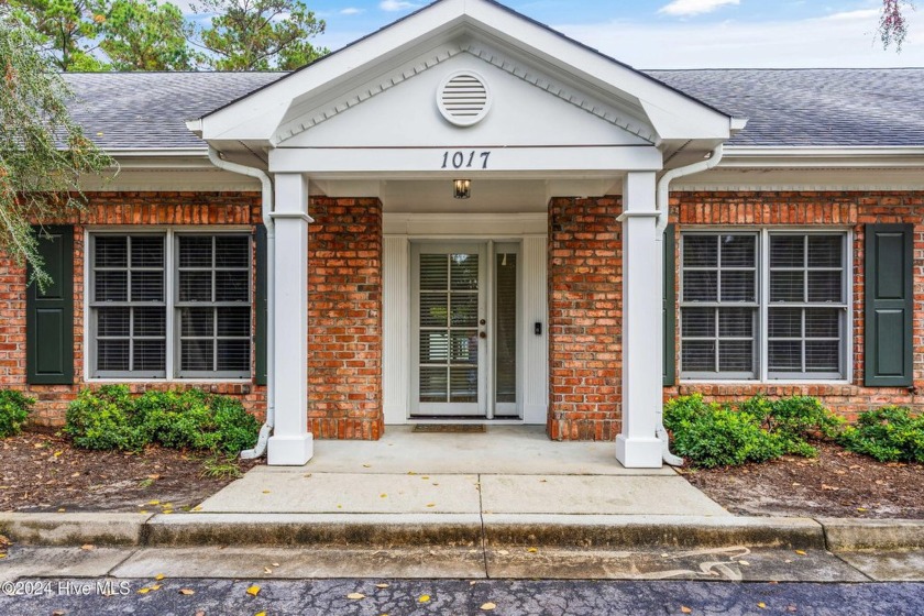 Nestled in a serene setting, this brick townhome at almost - Beach Townhome/Townhouse for sale in Wilmington, North Carolina on Beachhouse.com