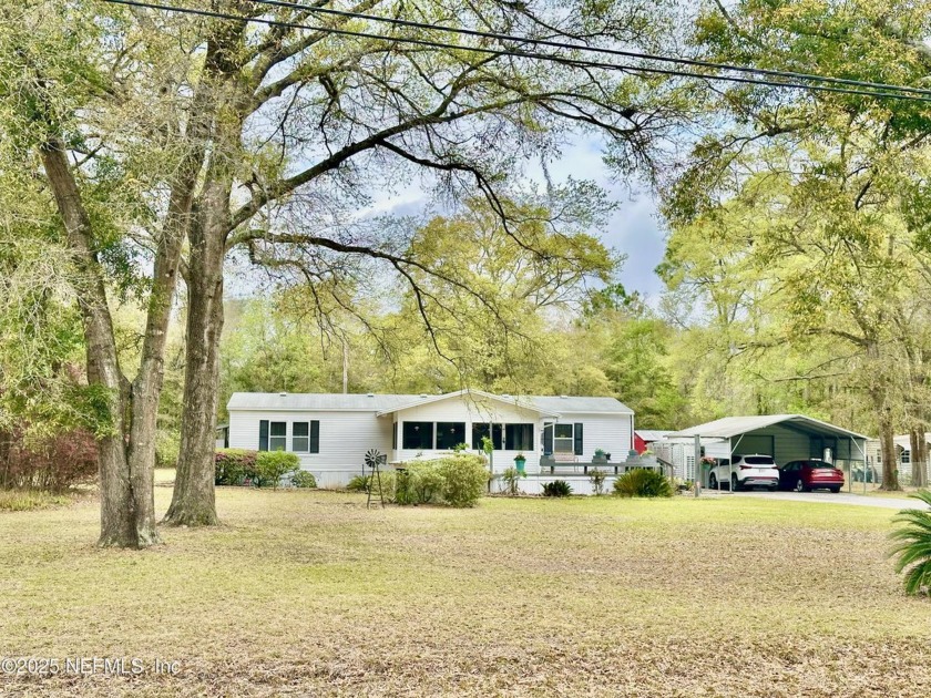 Come see this charming 3BR/2BA home that sits on a desirable - Beach Home for sale in Yulee, Florida on Beachhouse.com