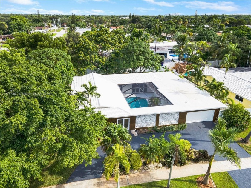 Welcome to your 3,000 sqft dream home! Nestled in the heart of - Beach Home for sale in Hollywood, Florida on Beachhouse.com