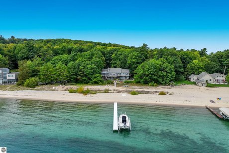 A rare offering for buyers seeking a phenomenal beachfront oasis - Beach Home for sale in Traverse City, Michigan on Beachhouse.com