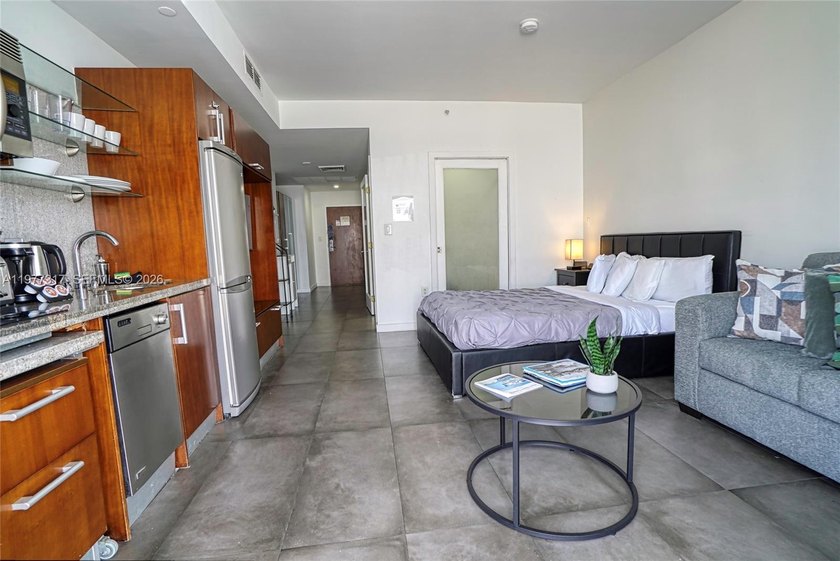 Turnkey condo-hotel studio unit located directly on iconic Ocean - Beach Condo for sale in Miami Beach, Florida on Beachhouse.com