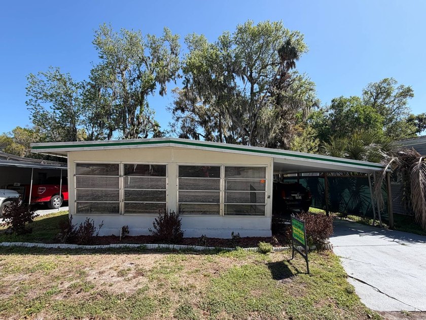 Quiet street, located in Carriage Cove, a premier 55+ land-lease - Beach Home for sale in Daytona Beach, Florida on Beachhouse.com