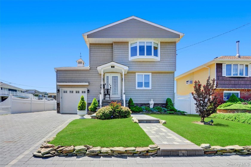 Beautiful Colonial located in the American Venice section of - Beach Home for sale in Lindenhurst, New York on Beachhouse.com