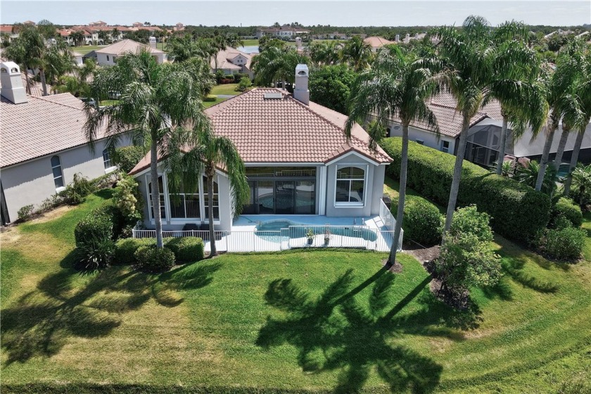 This stunning pool home with a lake view, is tastefully - Beach Home for sale in Vero Beach, Florida on Beachhouse.com