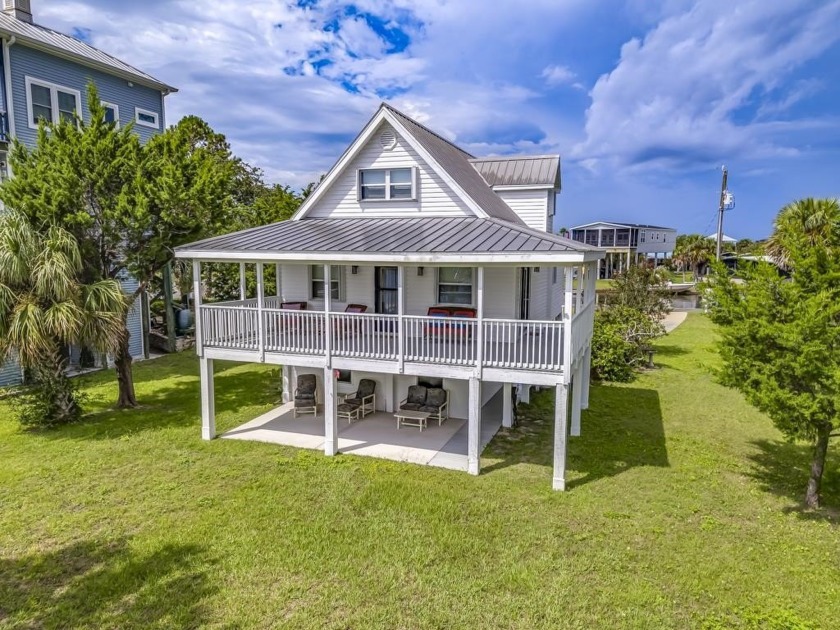 Beautiful waterfront gaetaway on a deep water canal with dock at - Beach Home for sale in Crawfordville, Florida on Beachhouse.com