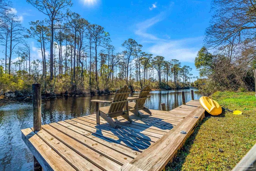 This rare Canal Front, has views of Perdido Bay, and a Swimming - Beach Home for sale in Pensacola, Florida on Beachhouse.com