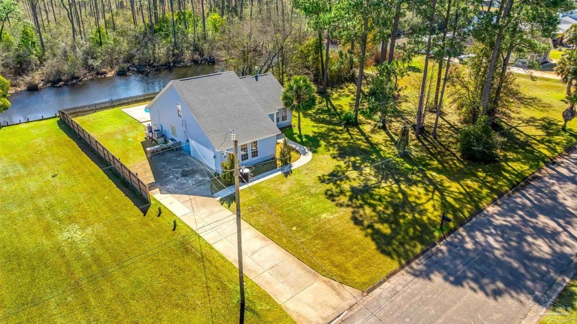 This rare Canal Front, has views of Perdido Bay, and a Swimming - Beach Home for sale in Pensacola, Florida on Beachhouse.com