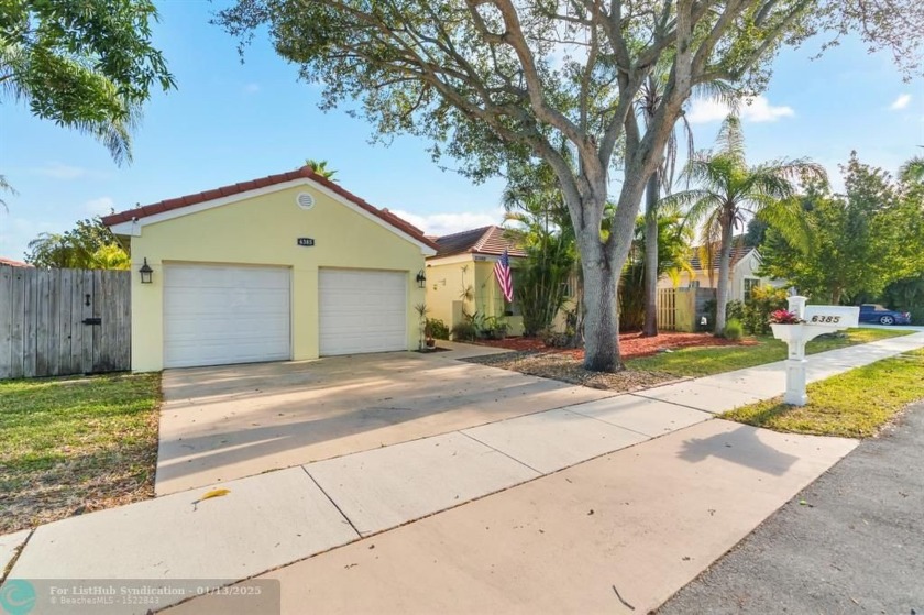 This 4-bedroom, 3-bathroom home offers serene water views of a - Beach Home for sale in Margate, Florida on Beachhouse.com