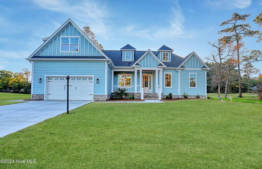 Step into paradise at 115 Genoes Point Road SW, where coastal - Beach Home for sale in Supply, North Carolina on Beachhouse.com