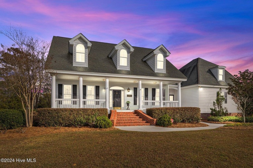 This exquisite 4-bedroom, 3.5-bath home offers marsh front views - Beach Home for sale in Morehead City, North Carolina on Beachhouse.com